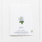 You Flourish More With Every Year - Floral Birthday Card featuring a white magnolia and poppy on a dark green background, folded with a kraft envelope.