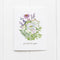 Genderqueer Pride Bouquet Card featuring a floral watercolor design with the message proud of you, blank inside, paired with a kraft envelope.