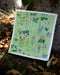 Wildflowers Sponge Cloth - Cellulose Sponge Dish Cloth featuring watercolor wildflowers on a green background, highlighting sustainable design with eco-friendly, biodegradable materials for effective cleaning.