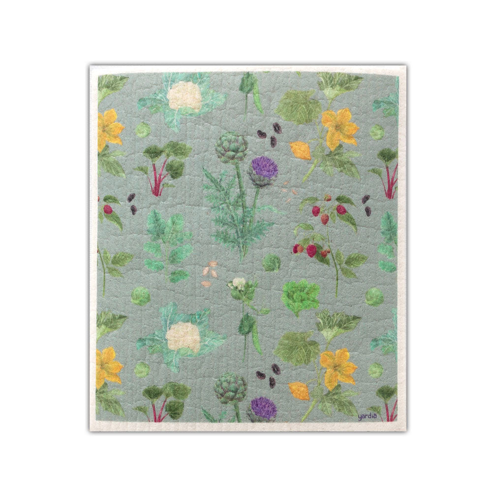 Kitchen Garden Sponge Cloth featuring watercolor vegetables and berries, designed by Brigida Swanson. Made from biodegradable cellulose and cotton for eco-friendly dish cleaning.