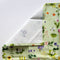 Wildflowers Tea Towel - Organic Cotton Kitchen Towel features watercolor wildflowers on spring green, perfect for enhancing kitchen aesthetics with natural charm.