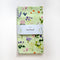 Wildflowers Tea Towel - Organic Cotton Kitchen Towel featuring a watercolor floral pattern on light green, designed by Brigida Swanson.