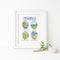 Magnolia and Discovery Park Watercolor Art Print, featuring four seasonal landscape illustrations, displayed with a candle and branch on a white surface. Frame not included.