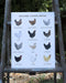 Backyard Chicken Breeds Art Print depicting twelve watercolor illustrations of popular chicken breeds, showcasing vibrant backyard flock portraits by artist Brigida Swanson.