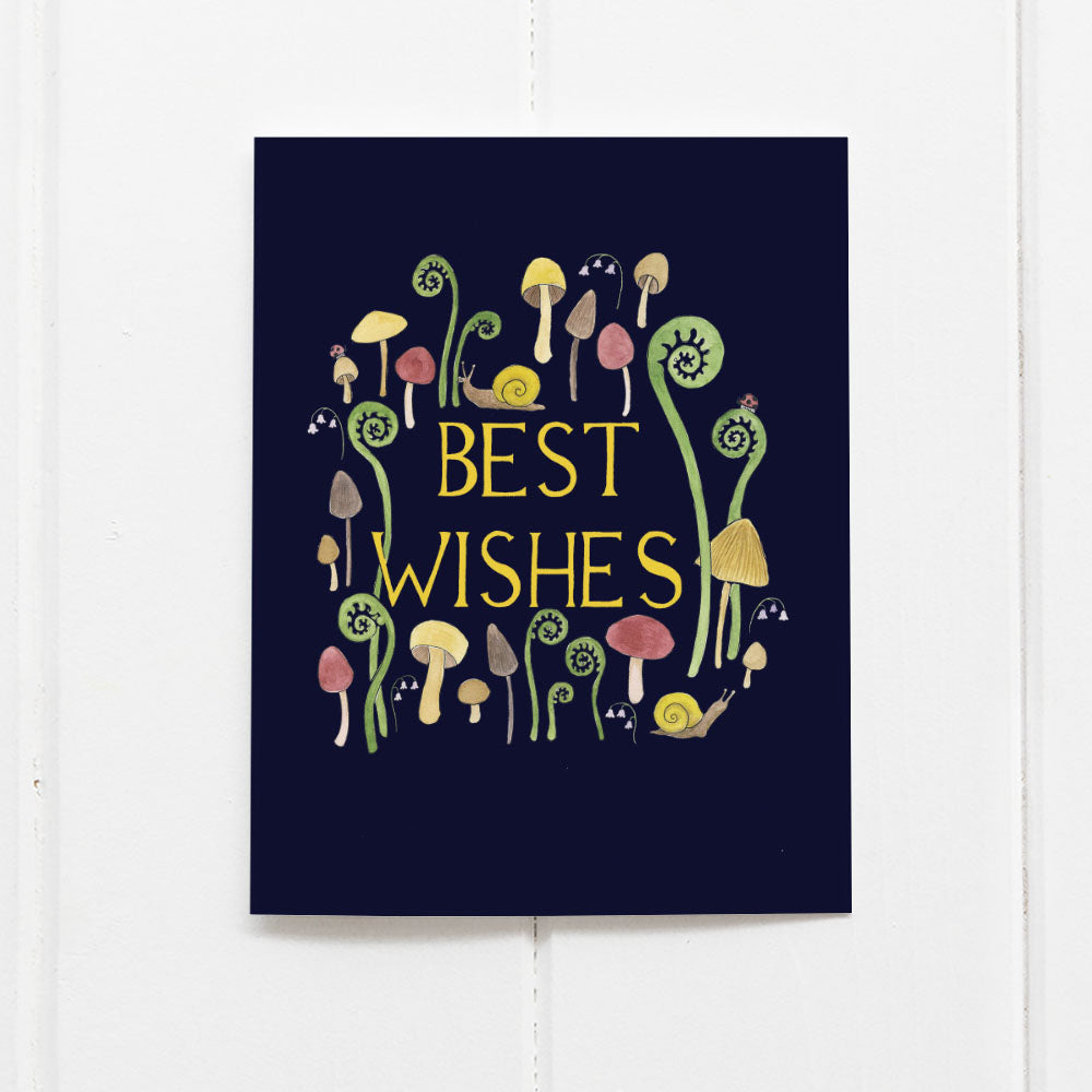 Best Wishes Mushrooms Card featuring whimsical watercolor mushrooms, snails, and ferns, perfect for celebrating special occasions. Blank inside, includes a kraft envelope.
