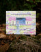 Cozy Birthday Card featuring a watercolor cottage with trees and flowers, blank inside, printed on recycled cardstock by artist Brigida Swanson, includes kraft envelope.