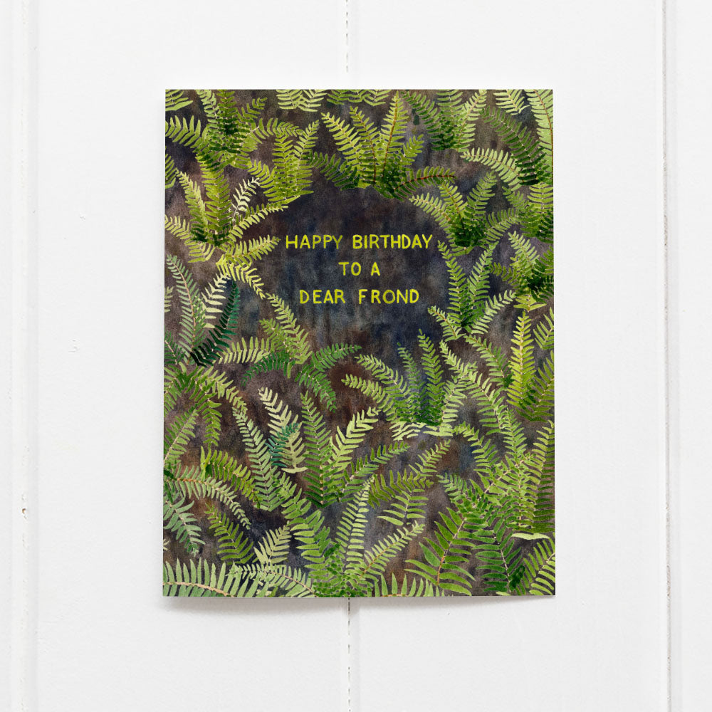 Happy Birthday To A Dear Frond Card featuring watercolor fern illustrations and hand-lettered text, designed by Brigida Swanson, printed on recycled cardstock.