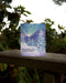 Boxed New Year Cards - Set of 6 features a watercolor winter scene with snow-covered pines and mountains, plus a punny New Year’s message.