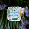 Gardening Is For Everyone Sticker on a plant, featuring watercolor vegetables and flowers. Weatherproof, fade-resistant, and 3 x 3. Perfect for gardening enthusiasts.