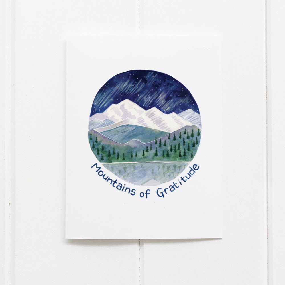 Mountains of Gratitude Thank You Card featuring a watercolor of Washington's Cascade Mountain range under a starry sky, blank inside, with kraft envelope.