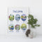 Tacoma Parks Art Print featuring watercolor illustrations of Tacoma's parks, paired with hand-lettered location names, framed alongside a candle and pinecone in a jar.