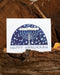 Hanukkah Card featuring a watercolor illustration of a tree-inspired menorah against a starry sky, printed on recycled cardstock, blank inside with kraft envelope.