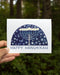 Hanukkah Card featuring a watercolor tree-inspired menorah with stars, held in a hand, showcasing Yardia's nature-inspired stationery. Blank inside with a kraft envelope.