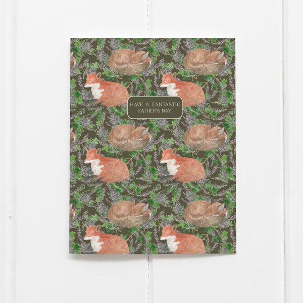 Fantastic Fox Father's Day Card with watercolor foxes amid leaves and blooms, featuring a heartfelt message. Blank inside for personalization. Includes kraft envelope.