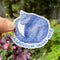 Childless Cat Ladies Vote Sticker featuring a blue watercolor cat held in a hand, emphasizing voter identity and cat-loving expression.