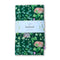Secret Garden Tea Towel - Organic Cotton Kitchen Towel features a woodland pattern with ivy, foxes, and hedgehogs, packaged with a Yardia paper band.