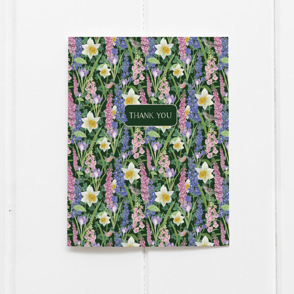 Spring Flowers Thank You Card with floral watercolor design features daffodils, foxgloves, and birds. Front label reads THANK YOU. Blank inside, includes kraft envelope.