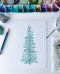 painting a blue spruce tree in watercolor