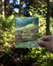 banana slug in forest birthday card reads happy belated birthday