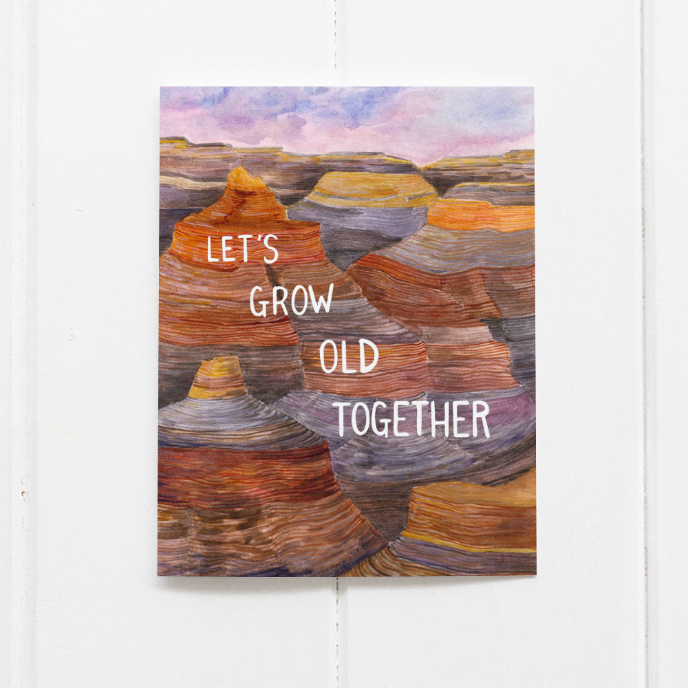 Love card with watercolor illustration of the Grand Canyon and text reading Let's Grow Old Together