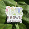 brown and flourishing sticker on rhubarb leaf in sunshine