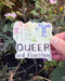 queer and flourishing sticker with wildflowers